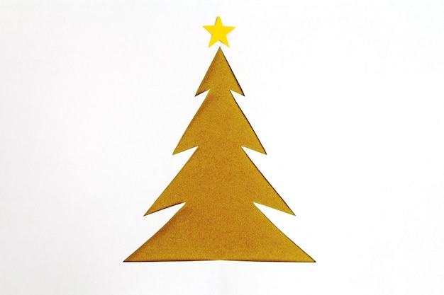 Gold christmas tree with star on top on white background