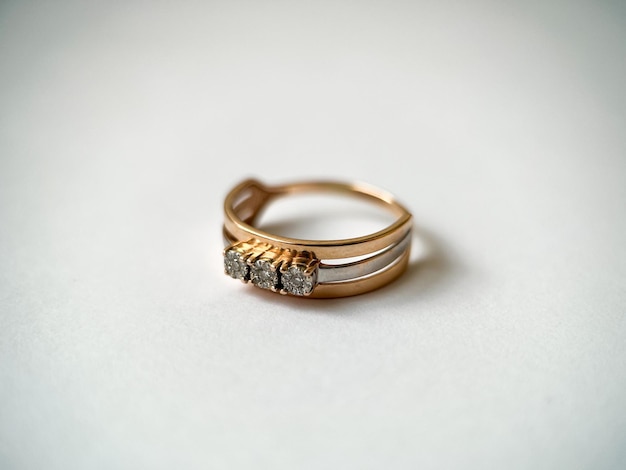 Gold diamond ring on a white isolated background Red Gold Ring