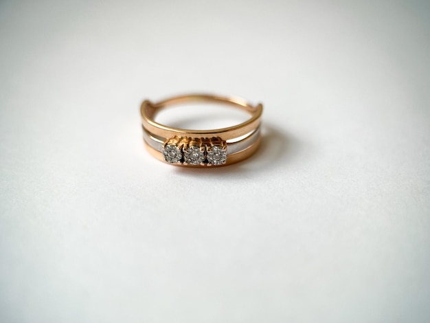 Gold diamond ring on a white isolated background Red Gold Ring