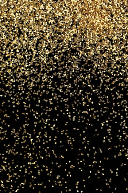 Gold glitter confetti background. Luxury New Year party celebration. Golden dust backdrop or texture.