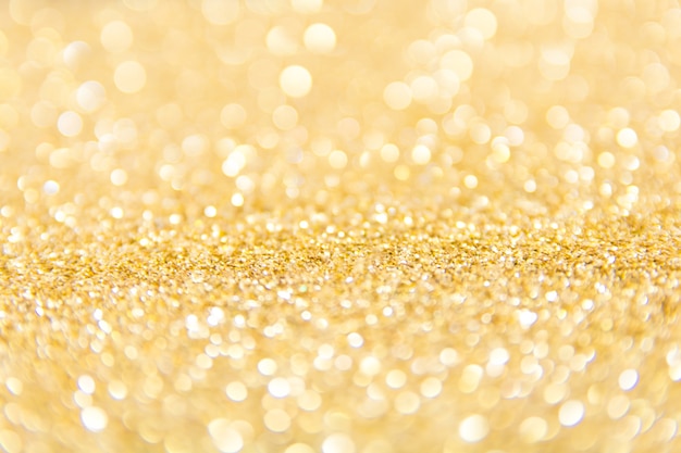 gold glitter defocused texture background. gold christmas abstract background