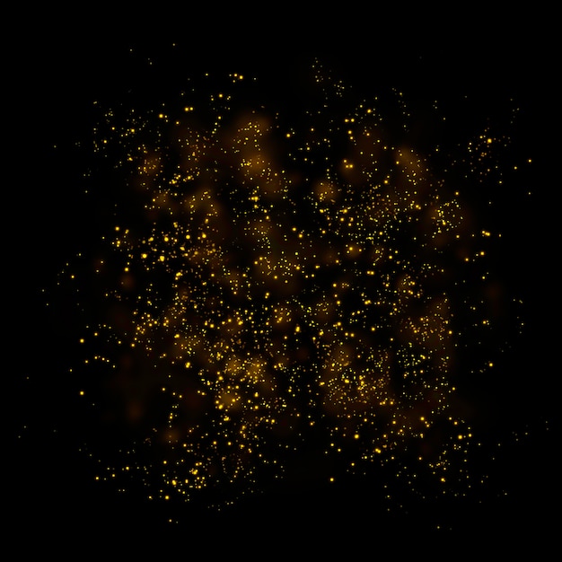 Gold glitter particles lights and bokeh on a black background.