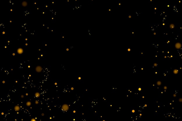 Gold glittering stars dust and bokeh background Abstract christmas glow light texture