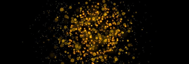 Gold glittering stars dust and bokeh background Abstract christmas glow light texture