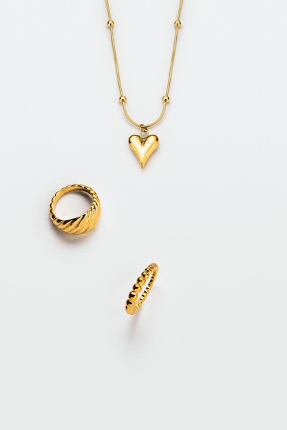 Gold jewelry on white background