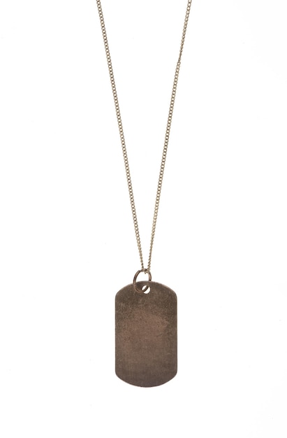 A gold metal tag with a chain that says'i love you'on it.