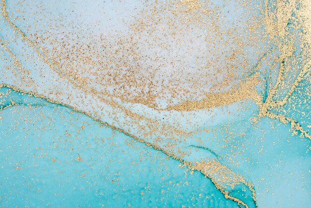 Photo gold paint on a turquoise background