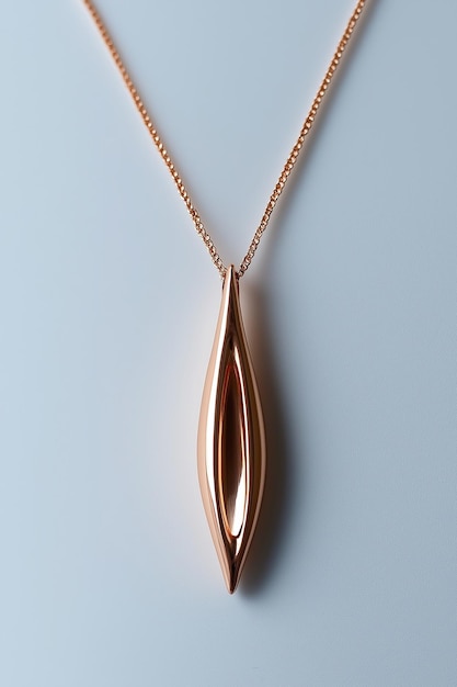 Photo gold pendant on a white background jewelry and fashion necklace design in rose gold