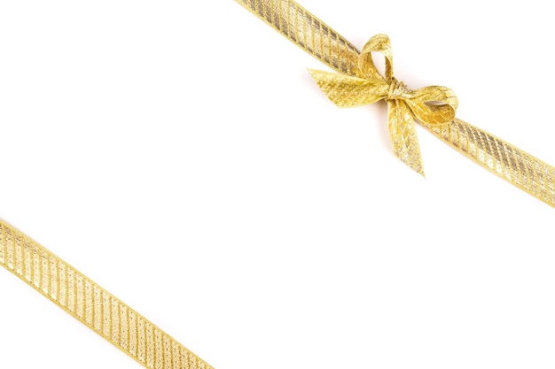 Gold ribbon bow isolated on white background Holyday's element