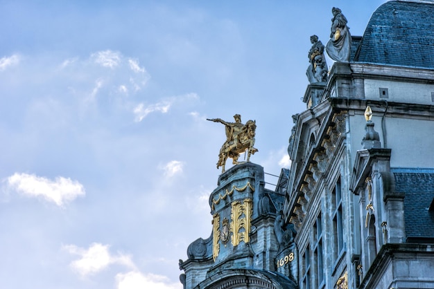 Gold Sculpture on the roof of the building on the square Grand Place in Brussels. Belgium.