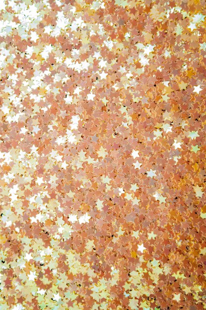 Gold sparkle christmas glitter stars background