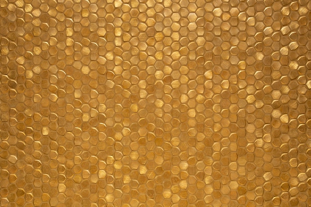 Gold sparkling little tiled wall background texture, modern luxury rich shiny mosaic pattern