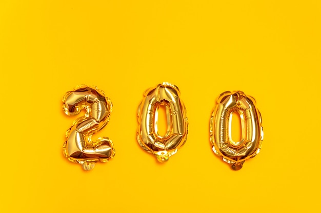 Photo golden 200 number balloons. foil and latex balloons. helium ballons. party, birthday, celebrate anniversary and wedding.