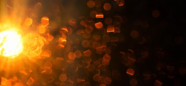 Golden abstract bokeh on a dark background