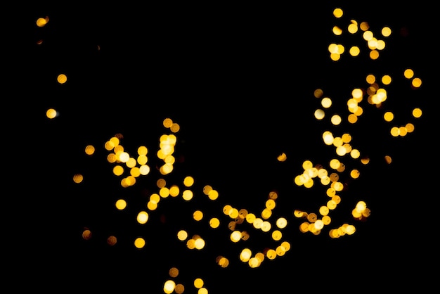 Golden abstract bokeh lights background Festive concept Place for design