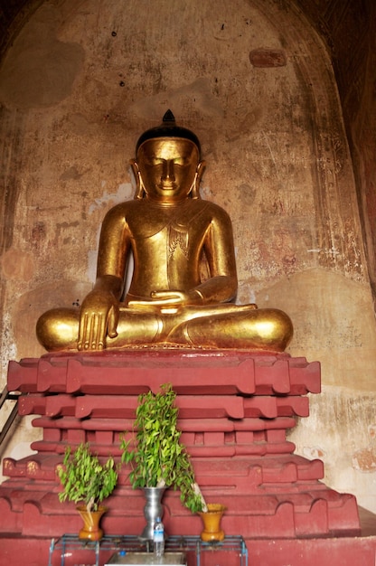 Golden buddha image statue burma style in Sulamani paya temple for burmese and foreign traveler travel visit respect praying in Minnanthu village at Bagan or Pagan heritage city in Mandalay Myanmar