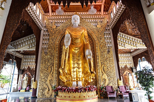 Golden Buddha statue at Dhammikarama Burmese Buddhist temple, Penang, Malaysia