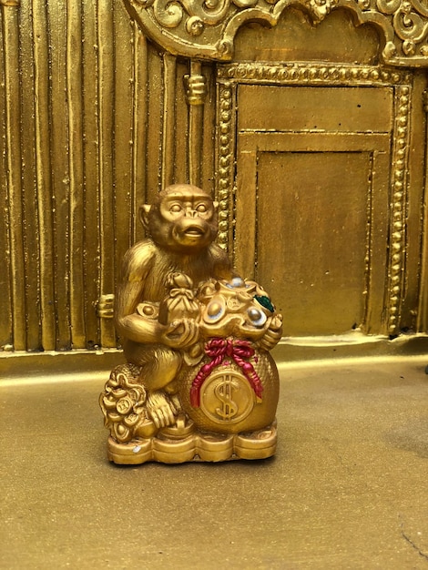 Golden Chinese Calendar Monkey Money