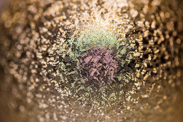 Golden Christmas ball with glitter close up macro