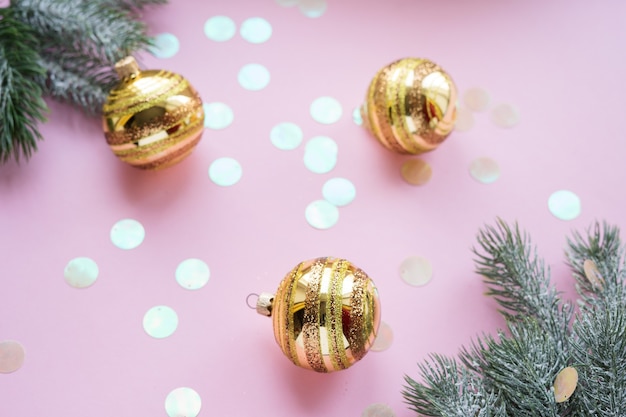 Golden Christmas balls and fir branches