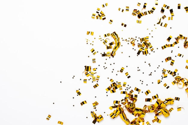 Golden confetti isolated