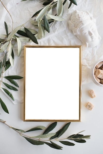 Golden frame mockup on white tabletop