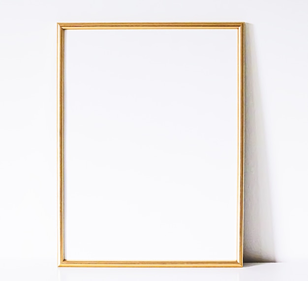 Golden frame on white furniture luxury home decor and design for mockup poster print and printable a...