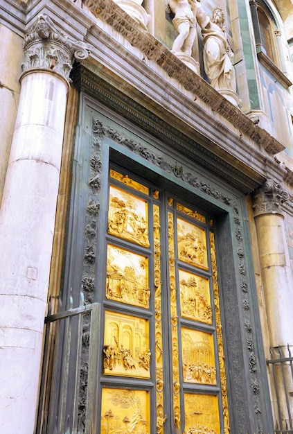 Golden Gate of Basilica di Santa Croce(Basilica of the Holy Cross) - famous Franciscan church on Florence, Italy