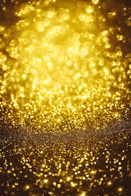 Golden glitter bokeh lighting texture Blurred abstract background for birthday anniversary wedding new year eve or Christmas