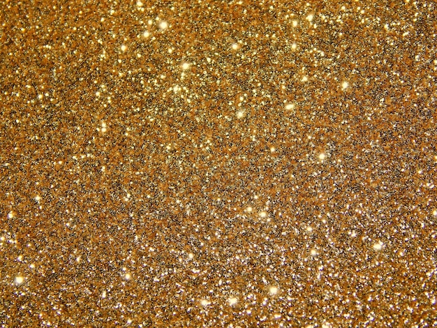 Golden Gold Bokeh glitter shimmer background texture.spark frame design.paper decoration.holidays