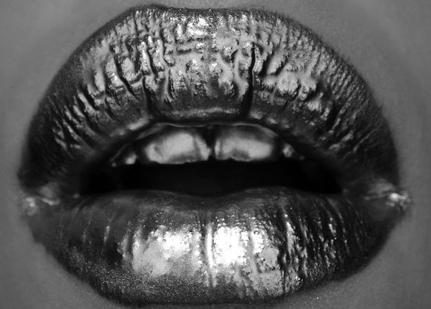 Golden lipstick closeup lips with metal makeup