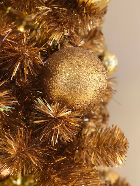 Golden Merry Christmas ball background. Happy new year and christmas 2023