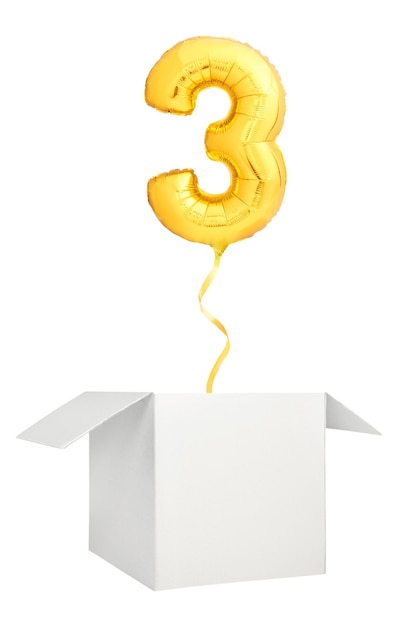 Golden number three balloon flying out of blank white box isolated on white background