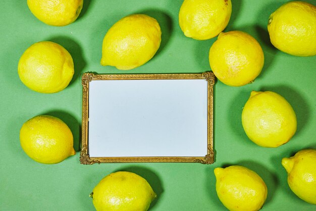 golden picture or photo frame mockup with yellow lemon fruits