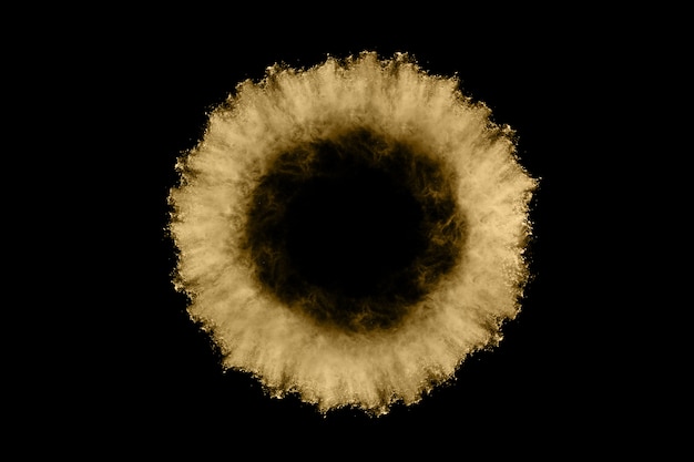 Golden powder explosion on black background 