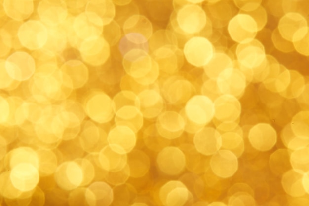 Golden rich expensive abstract background with bokeh effect shining sparkles shimmer jewels