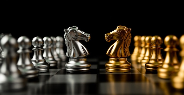 Golden and silver horse chess pieces