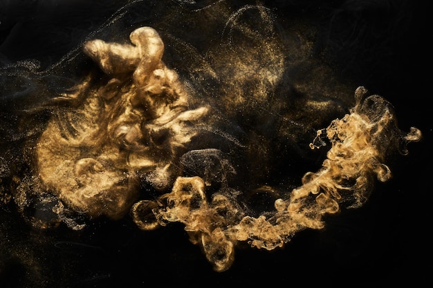 Golden sparkling abstract background luxury black smoke acrylic paint underwater explosion cosmic swirling ink