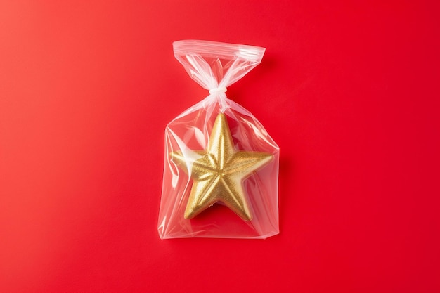 A golden star shaped in transparent plastic bag