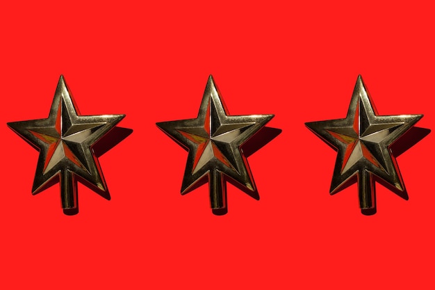 Golden stars on red background