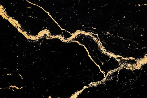 Golden streaks on a marble texture