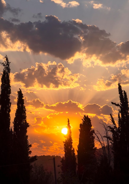 Golden summer sunset with beautiful Cumulus clouds in Greece