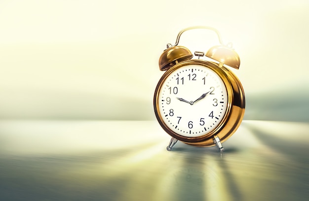 Golden time concept 3D image with golden alarm clock