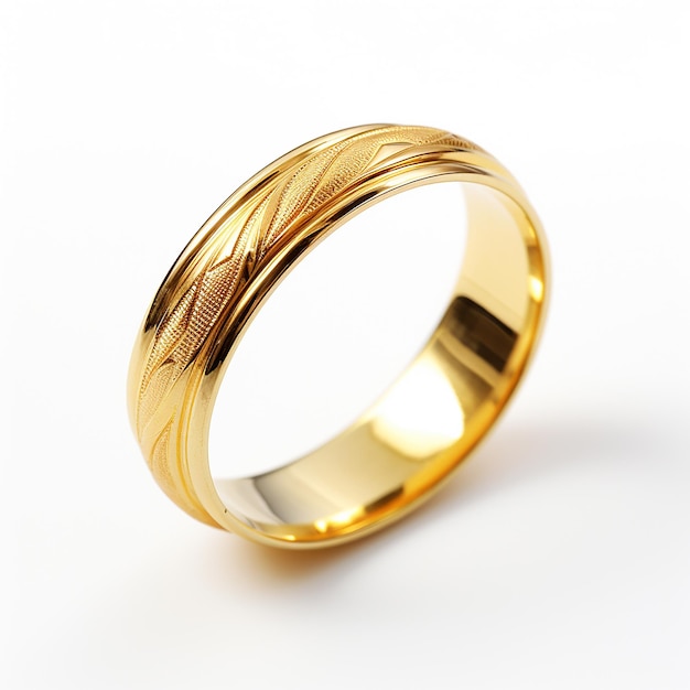 Golden wedding ring on white background