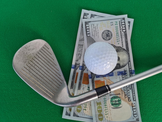 Golf ball golf club on green grass Making money and playing for money in golf