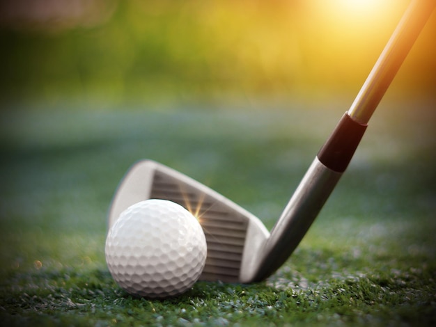 Golf club close up grass on blurred beautiful landscape of golf background