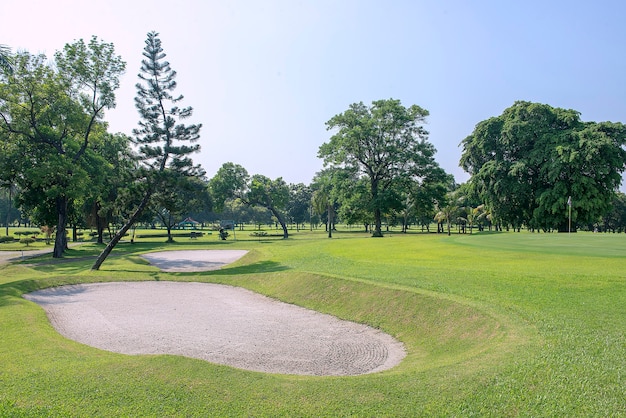 Golf course with blue sky background