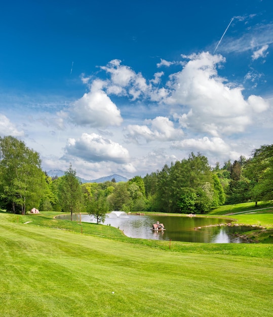 Golf field European landscape with beautiful blue sky