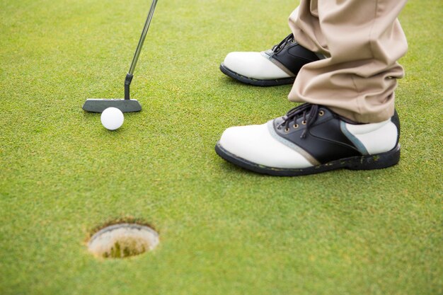 Golfer about to tee off