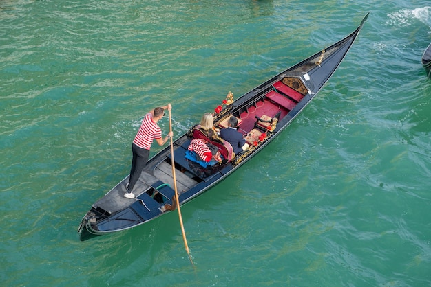 Gondola that transports tourists on vacation in Venice